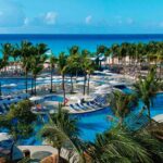 🏨☀️ Descubre la experiencia única en el Hotel Riu Yucatán: ¡Tu paraíso caribeño playero!