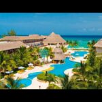 🏖️ ¡Descubre el paraíso en 🐠 Reef Coco Beach! El destino perfecto para unas vacaciones inolvidables